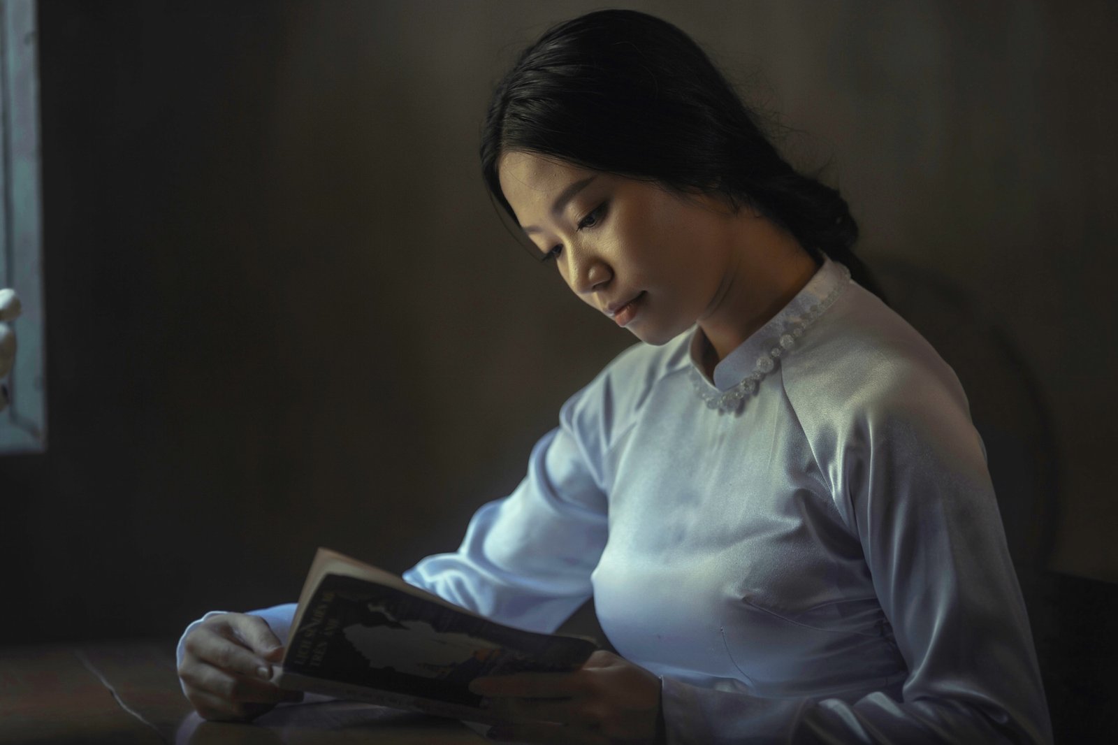 Reading by lamplight